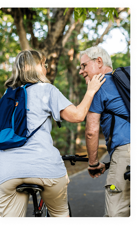 An older couple enjoying an active, healthy lifestyle outdoors