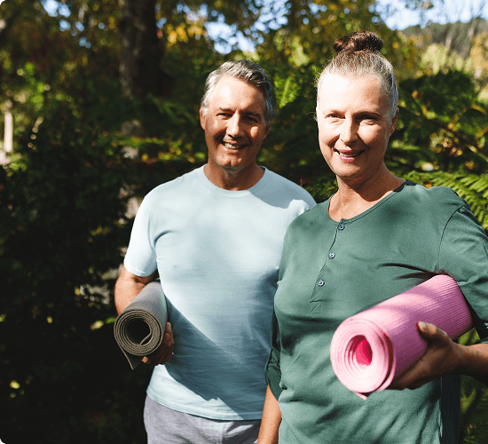 A Planwise adviser meeting with a senior couple